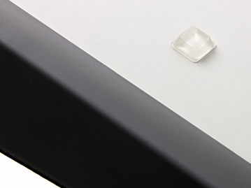 close up of rubber safety non-slip legs under a baby changing mat